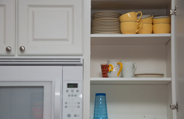 An organized kitchen cupboard