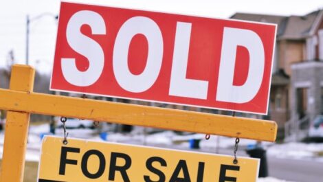 Sold sign on a winter day