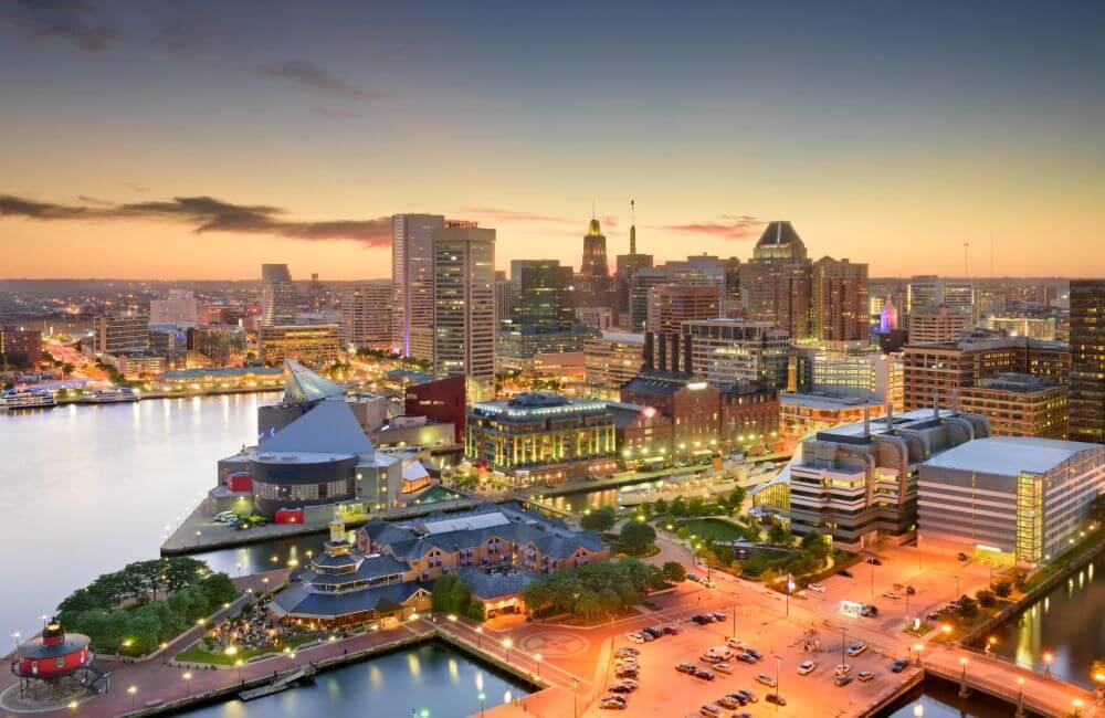 Skyline view of the inner harbor in Baltimore, Maryland at dusk.