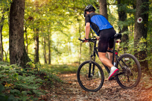 A man goes for an energizing ride on a DC bike trail.