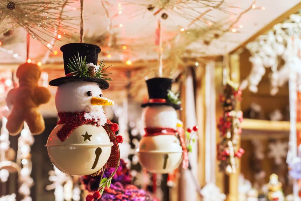 Holiday decorations hang for sale in a market