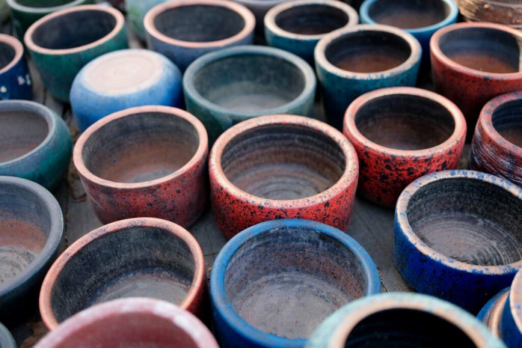 Close-up of empty ceramic flower pots for planting.