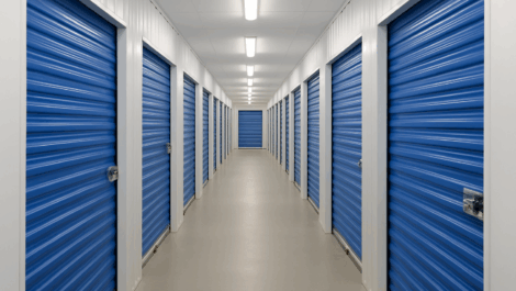 Self Storage facility interior with blue doors