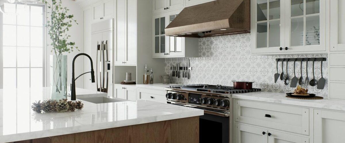 A large kitchen stocked with appliances and an island ready to welcome its new chef.