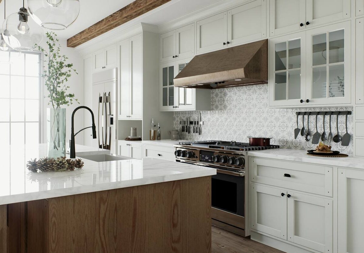 A large kitchen stocked with appliances and an island ready to welcome its new chef.
