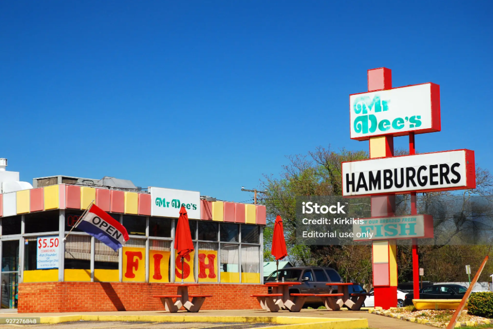 Local restaurant in Fredericksburg, VA, with outdoor seating and diner-style sign